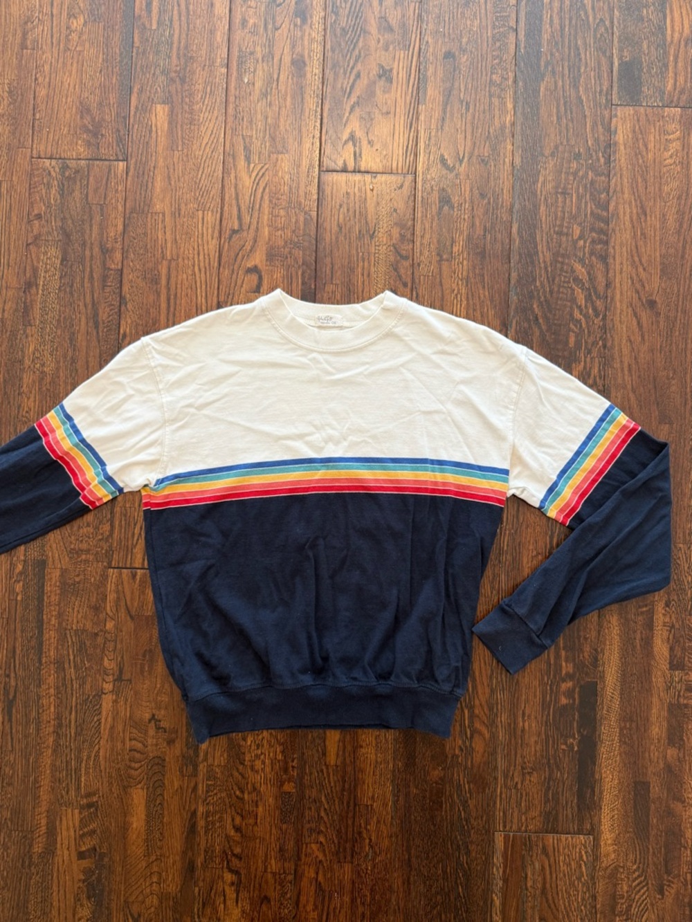 Brandy Melville J-Galt navy and white with rainbow stripe long sleeved tee.